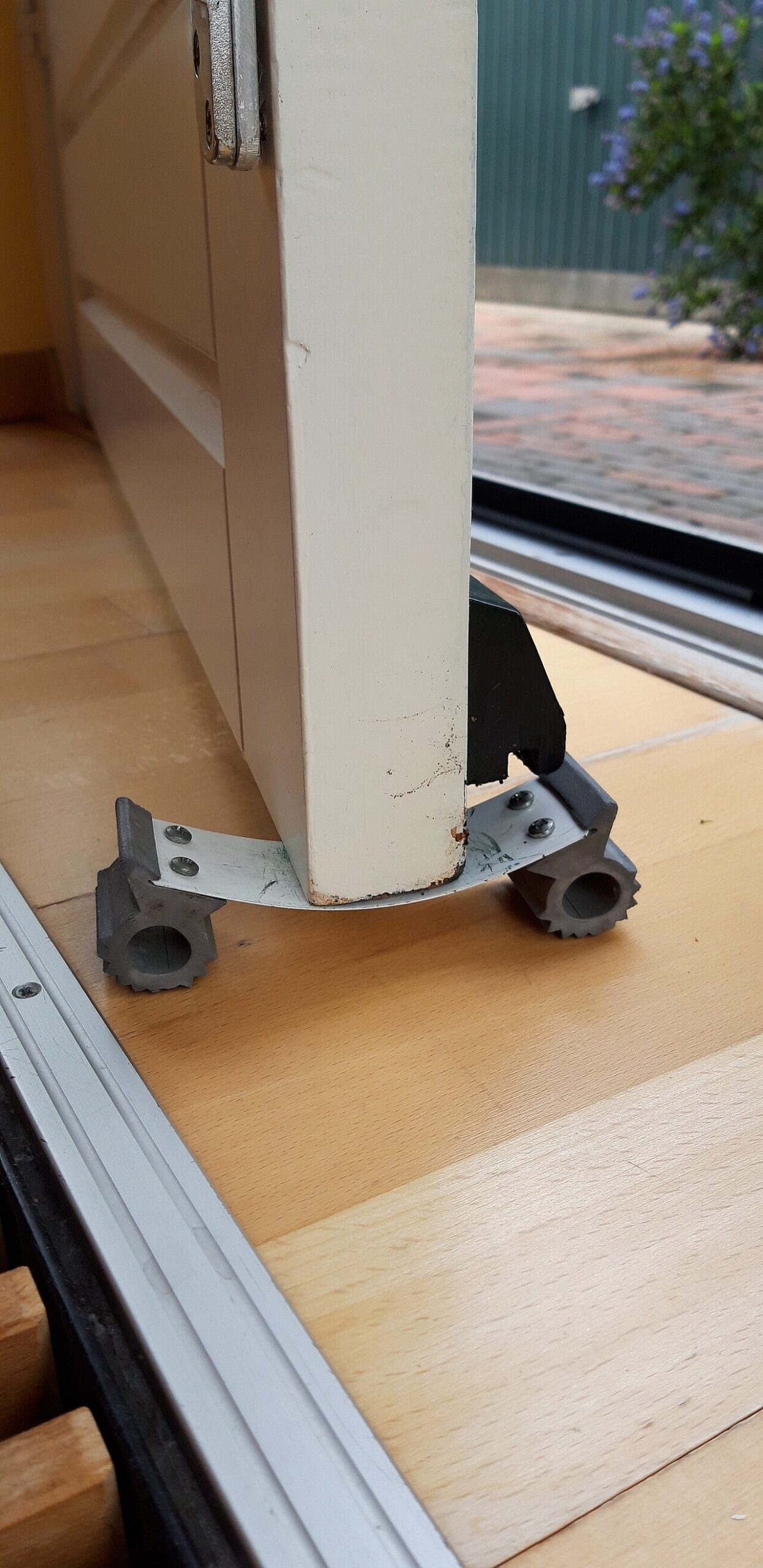 Door security bars for hinged doors: how they work and what renters should know